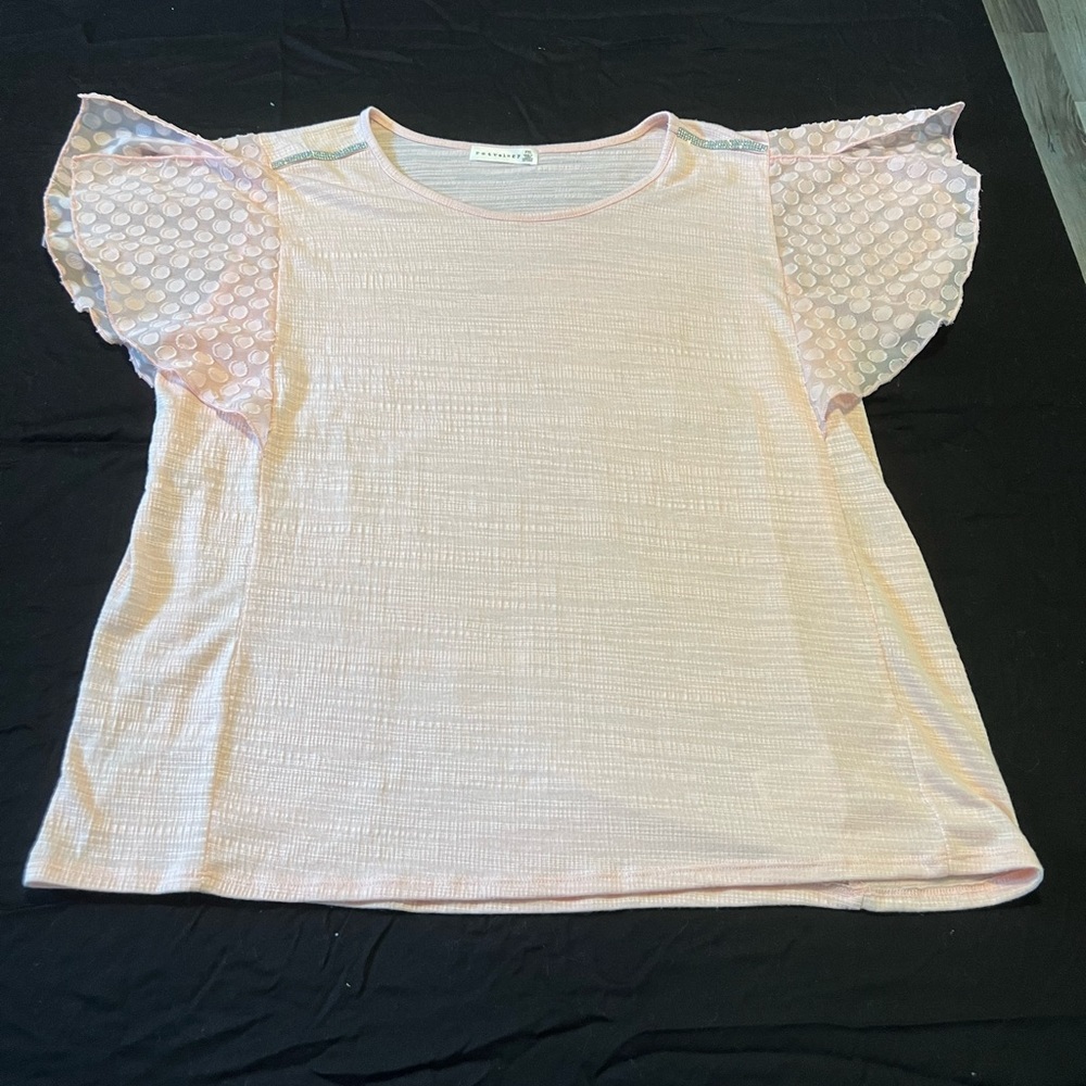 Woman’s xl light pink top w/rhinestones.